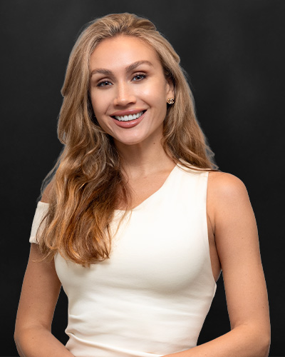 Olga Hoffmann is  at JVC Properties Dubai